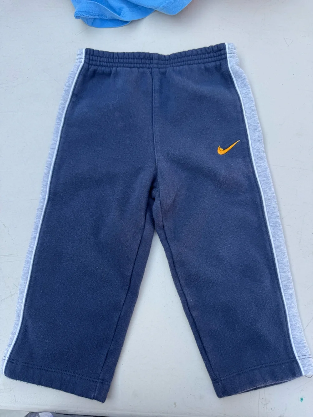Nike Boys Navy Sweatpants with Yellow Swoosh and Gray Side Panels
